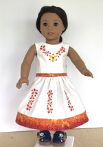Folk style skirt and top decorated with embroidery for a 18-inch doll